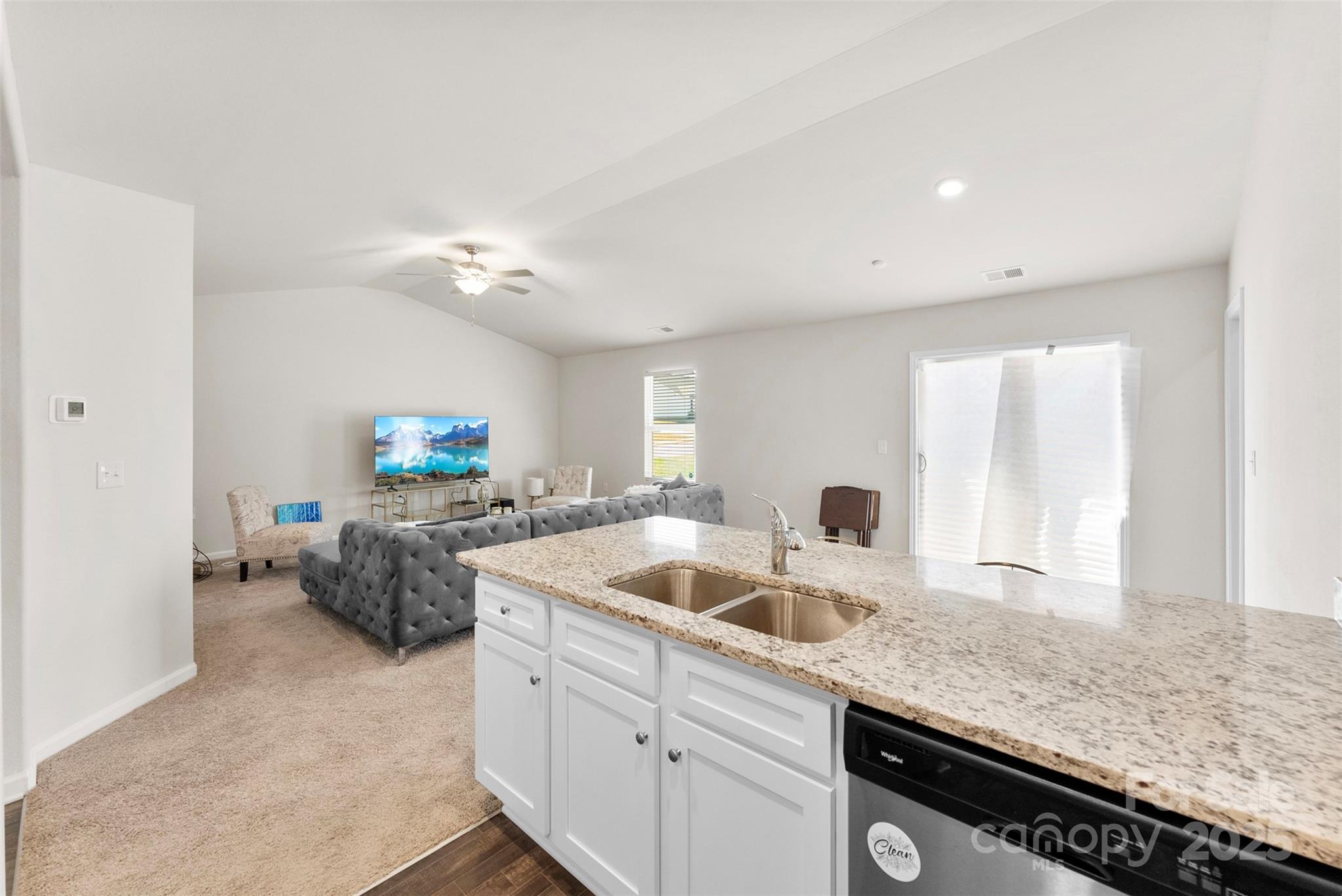 223 Frank Burns Way Kings Mountain, NC 28086 - Photo 20 of 36 a kitchen with granite countertop a sink and a stove