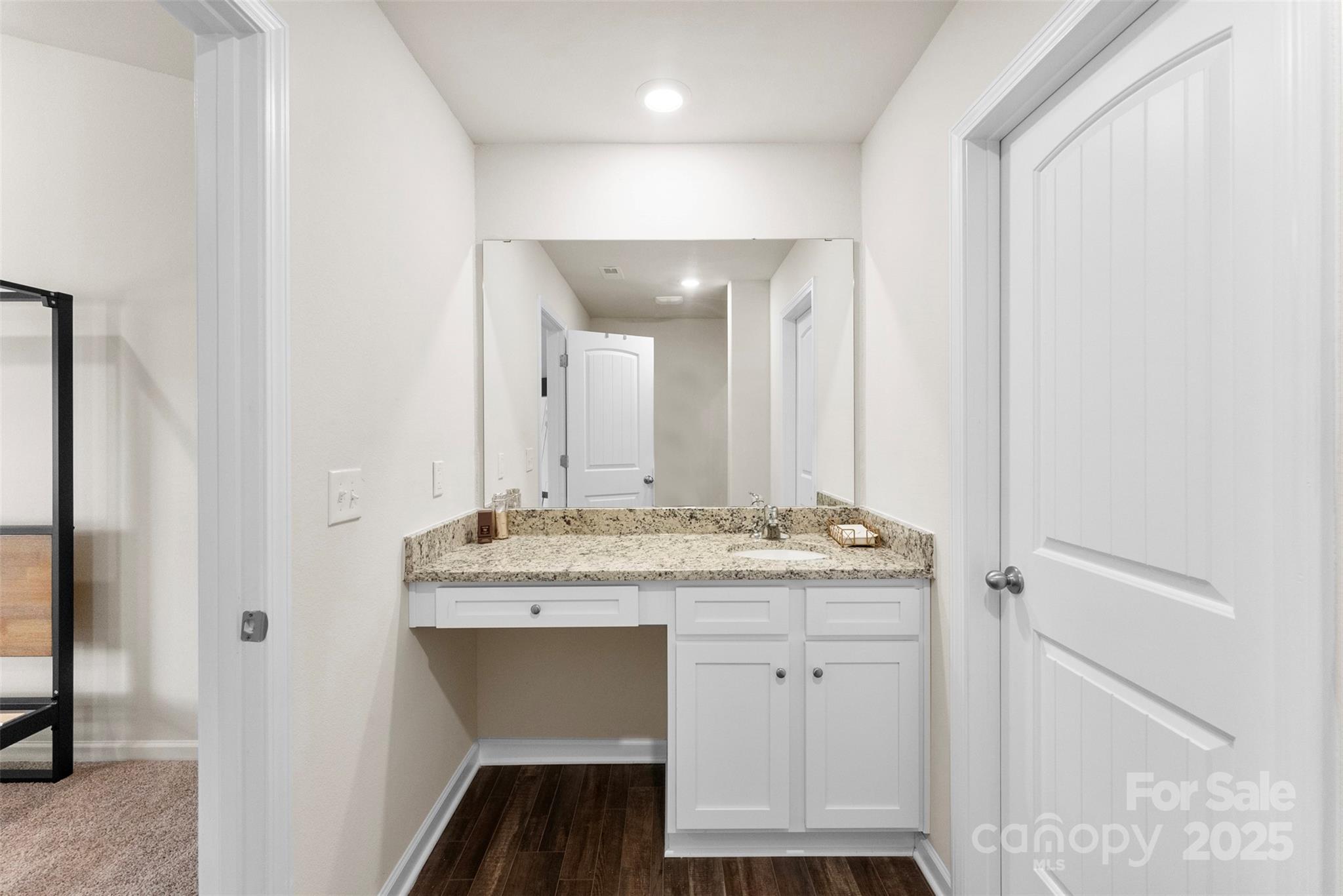 223 Frank Burns Way Kings Mountain, NC 28086 - Photo 26 of 36 a bathroom with a granite countertop sink and a mirror
