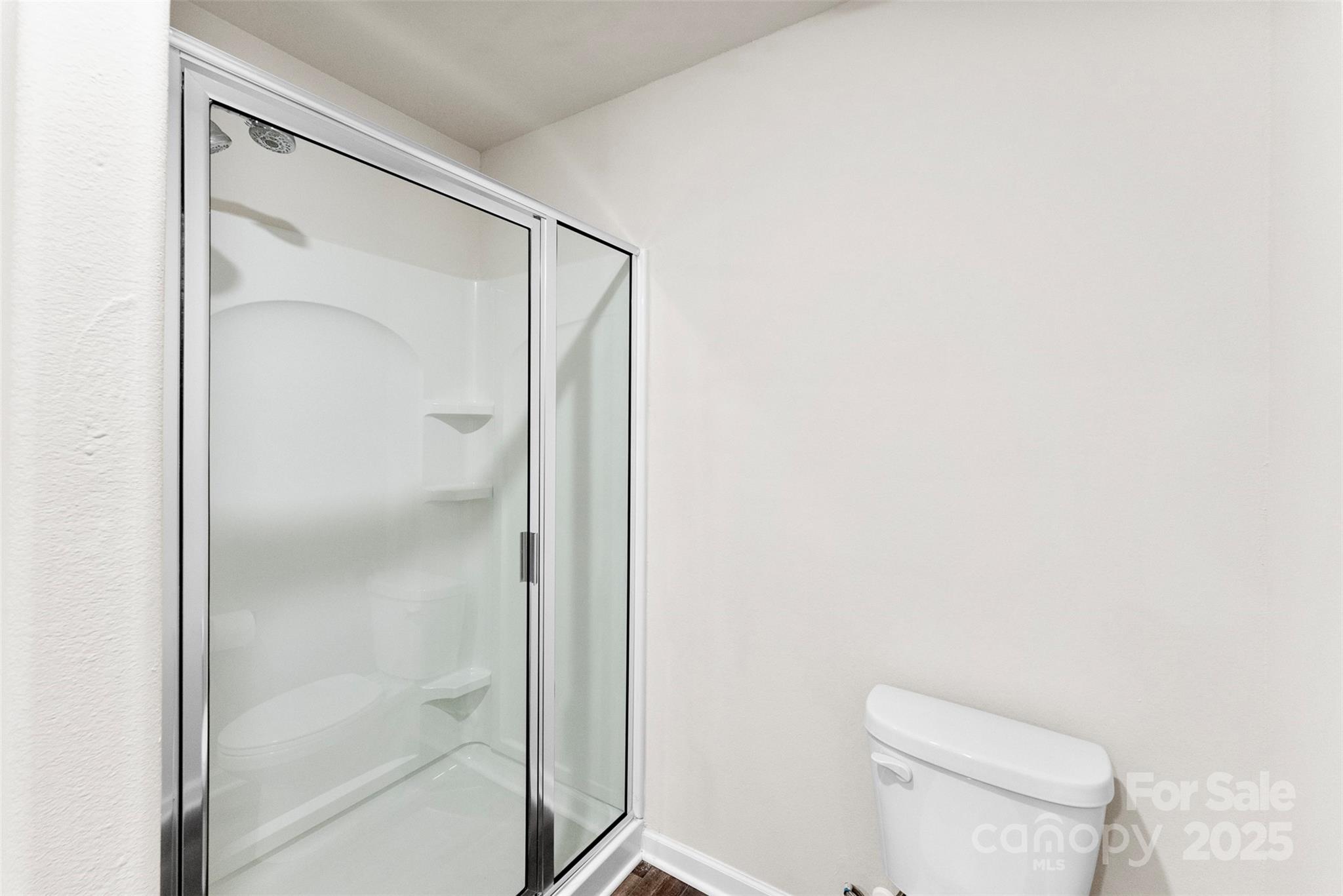 223 Frank Burns Way Kings Mountain, NC 28086 - Photo 27 of 36 a bathroom with a shower and a toilet