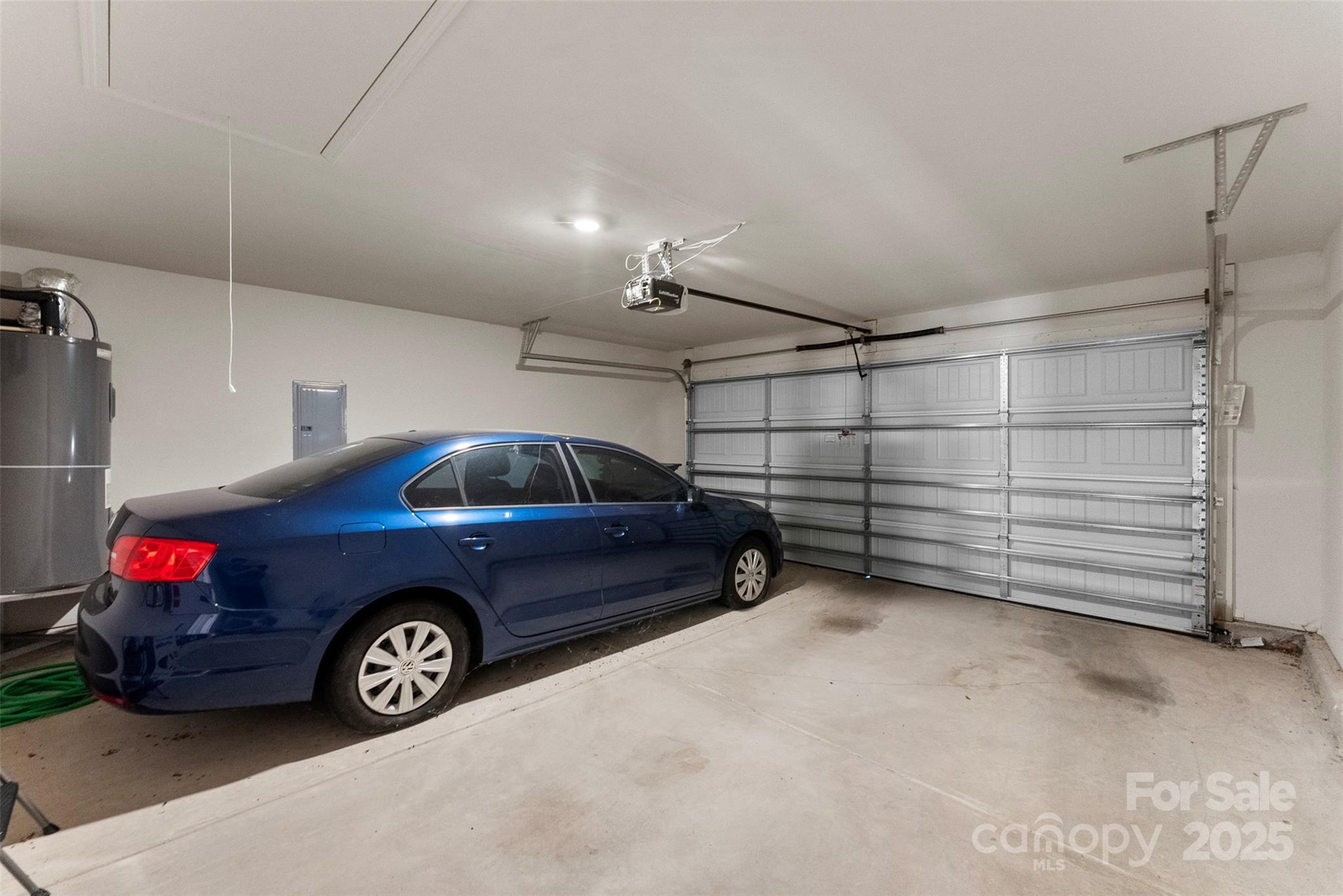 223 Frank Burns Way Kings Mountain, NC 28086 - Photo 33 of 36 a car parked in a garage