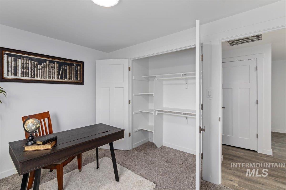1184 Starfire Street Twin Falls, ID 83301 - Photo 21 of 34 Home office with light colored carpet and baseboards