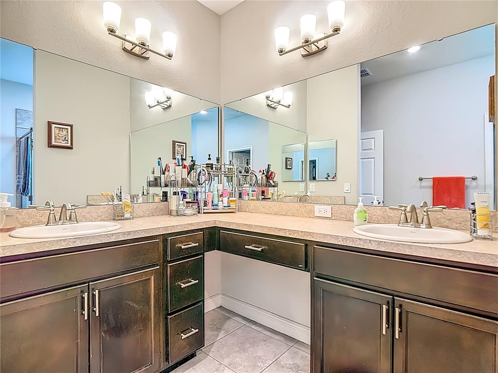 237 Walkers Point Drive Auburndale, FL 33823 - Photo 12 of 31 a kitchen with a sink and stove
