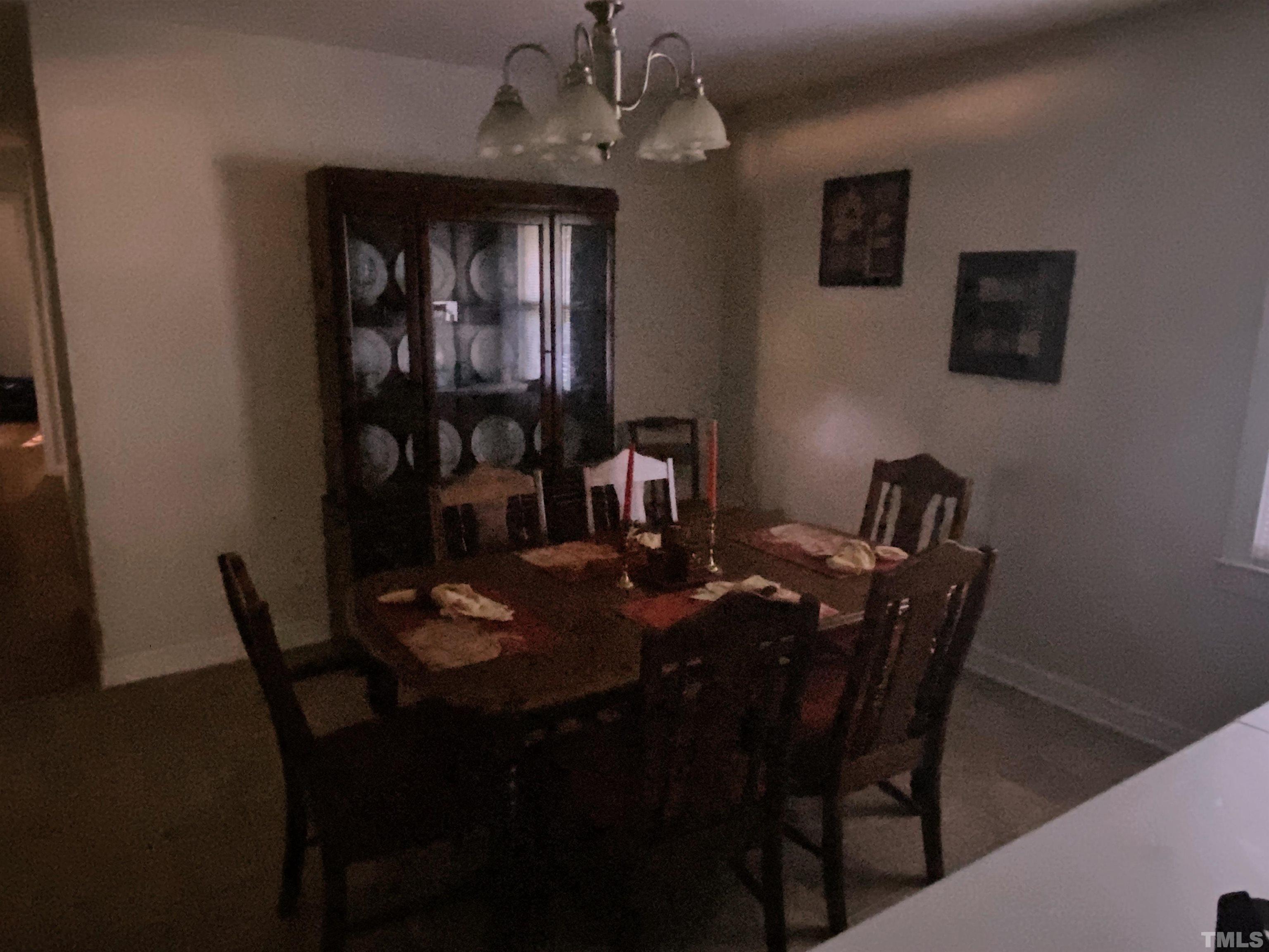610 St George Road Raleigh, NC 27610 - Photo 3 of 9 a dining room with furniture and window