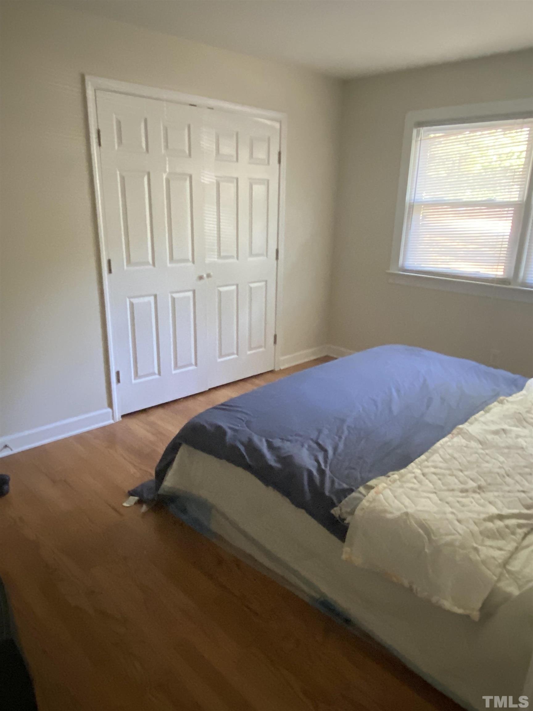 610 St George Road Raleigh, NC 27610 - Photo 7 of 9 a bed sitting in a bedroom next to a window