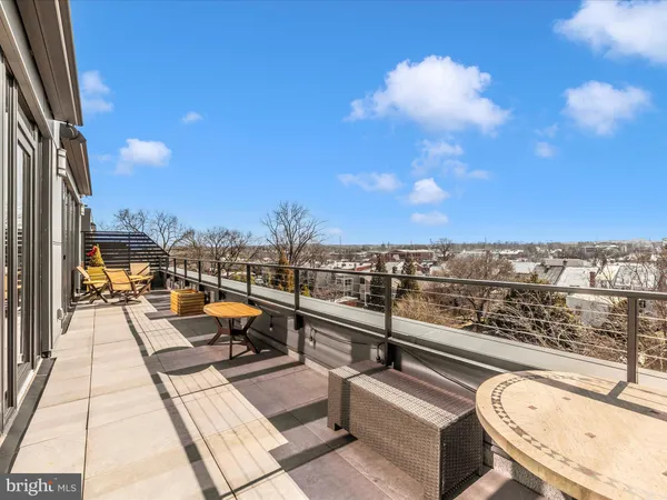 a view of a terrace with furniture