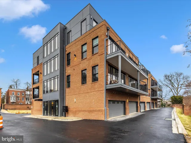 a view of a building with a street