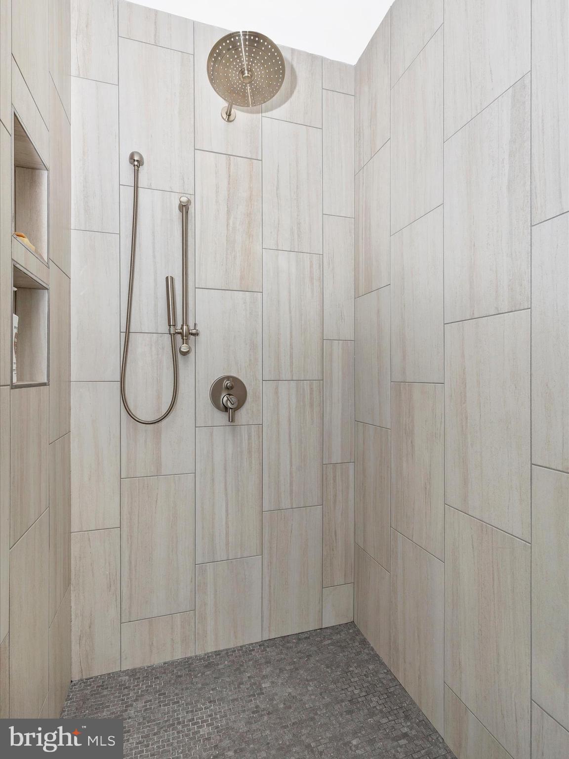 210 East 2nd Street, Unit 401 Frederick, MD 21701 - Photo 41 of 51 a bathroom with a shower