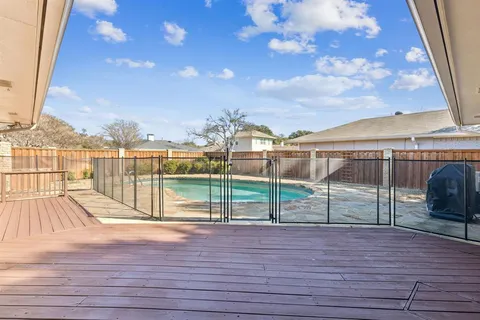 a view of outdoor space with wooden deck