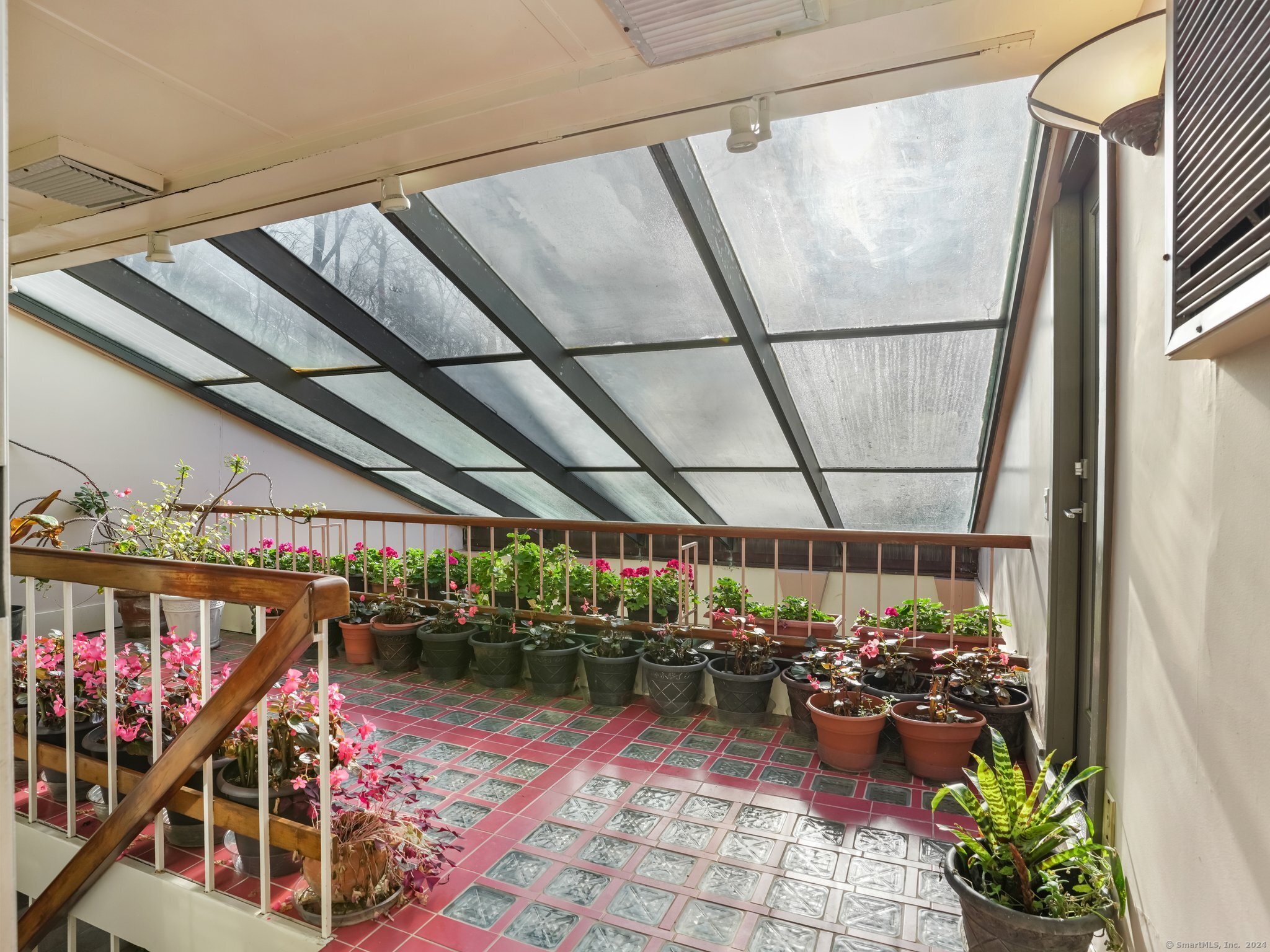 8 Bayberry Ridge Road Westport, CT 06880 - Photo 22 of 40 Solarium has stairs down to the Indoor pool and Sun Deck access.