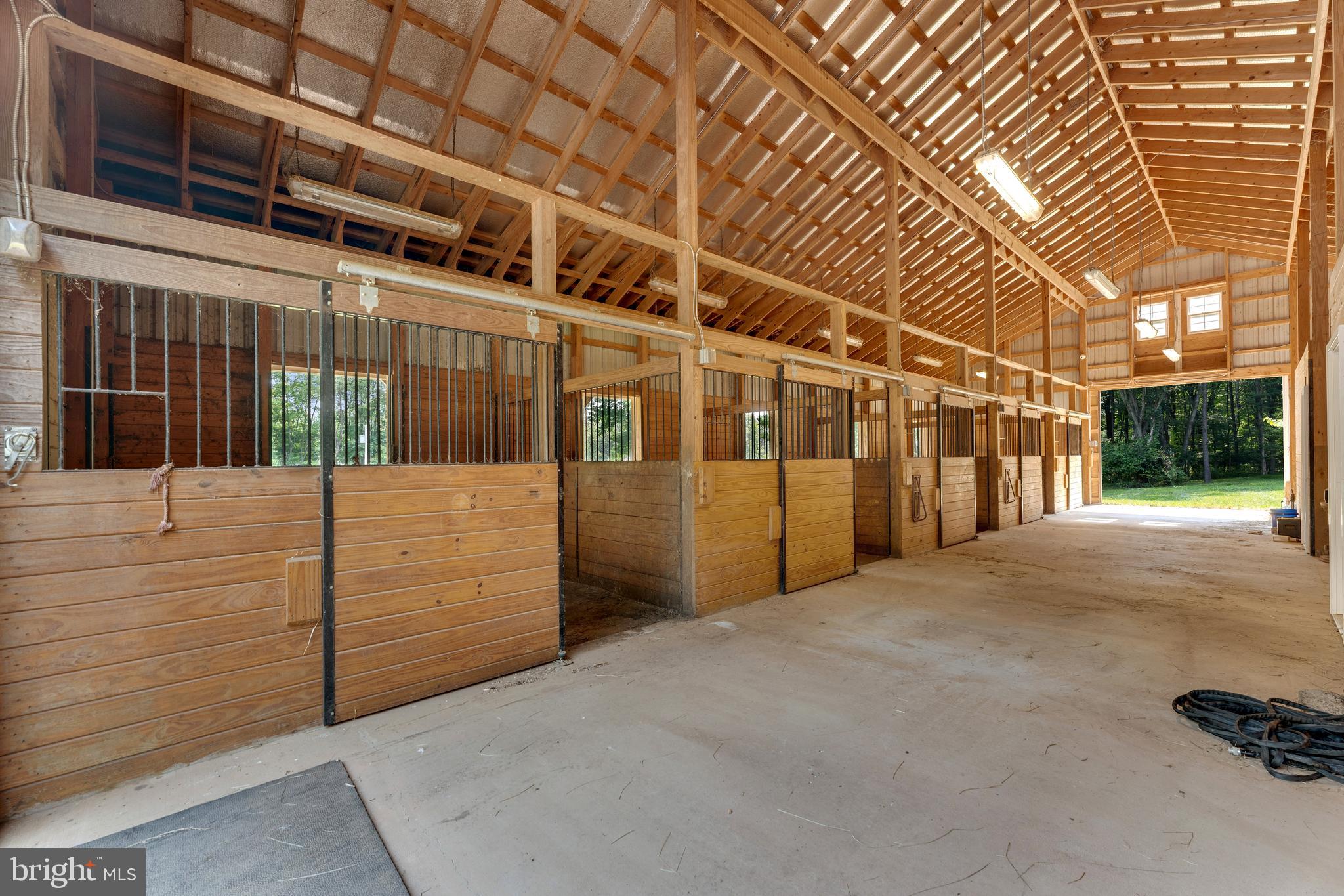 4346 Basford Road Frederick, MD 21703 - Photo 14 of 149 Five stalls are matted and open to paddocks