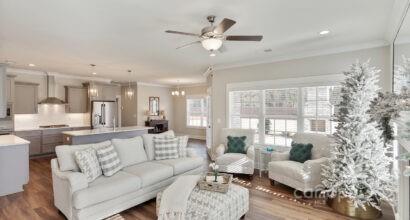 3409 Sincerity Road, Unit 15 Monroe, NC 28110 - Photo 18 of 32 a view of a living room kitchen and a large window