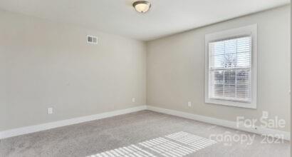 3409 Sincerity Road, Unit 15 Monroe, NC 28110 - Photo 31 of 32 an empty room with a window
