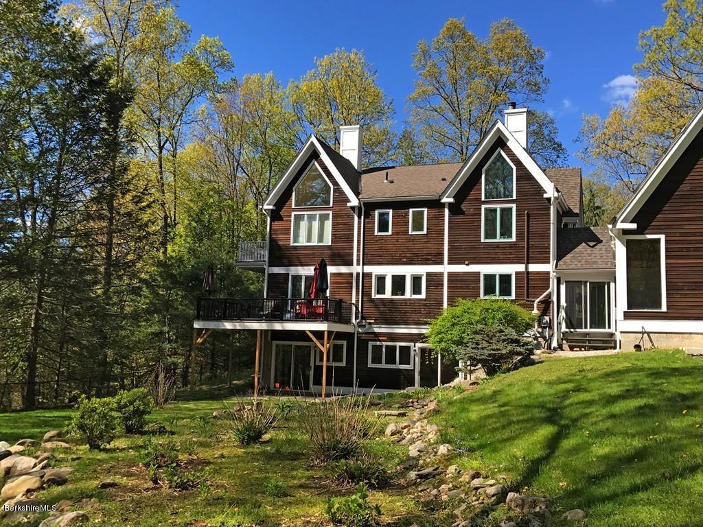 7 Cider Mill Road Williamsburg, MA 01039 - Photo 2 of 30 front view of a house with a yard