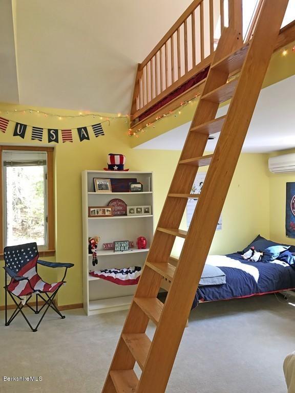 7 Cider Mill Road Williamsburg, MA 01039 - Photo 16 of 30 a bedroom with bed and a window