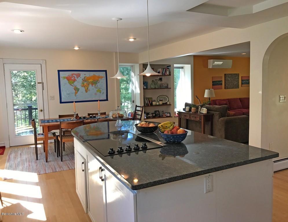 7 Cider Mill Road Williamsburg, MA 01039 - Photo 3 of 30 a kitchen with a stove a sink and a refrigerator
