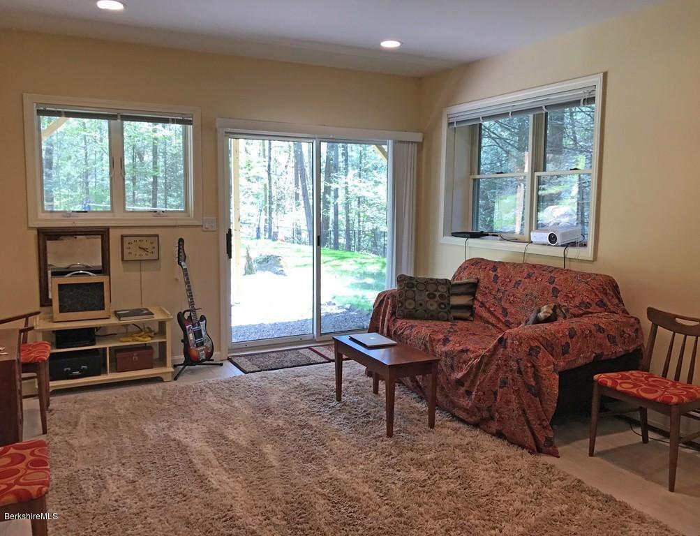 7 Cider Mill Road Williamsburg, MA 01039 - Photo 27 of 30 a living room with furniture and a window