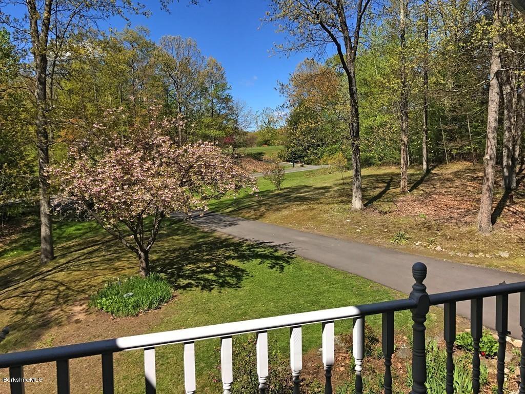 7 Cider Mill Road Williamsburg, MA 01039 - Photo 28 of 30 a view of a yard with wooden fence