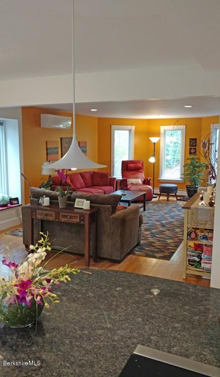 7 Cider Mill Road Williamsburg, MA 01039 - Photo 7 of 30 a living room with a fireplace