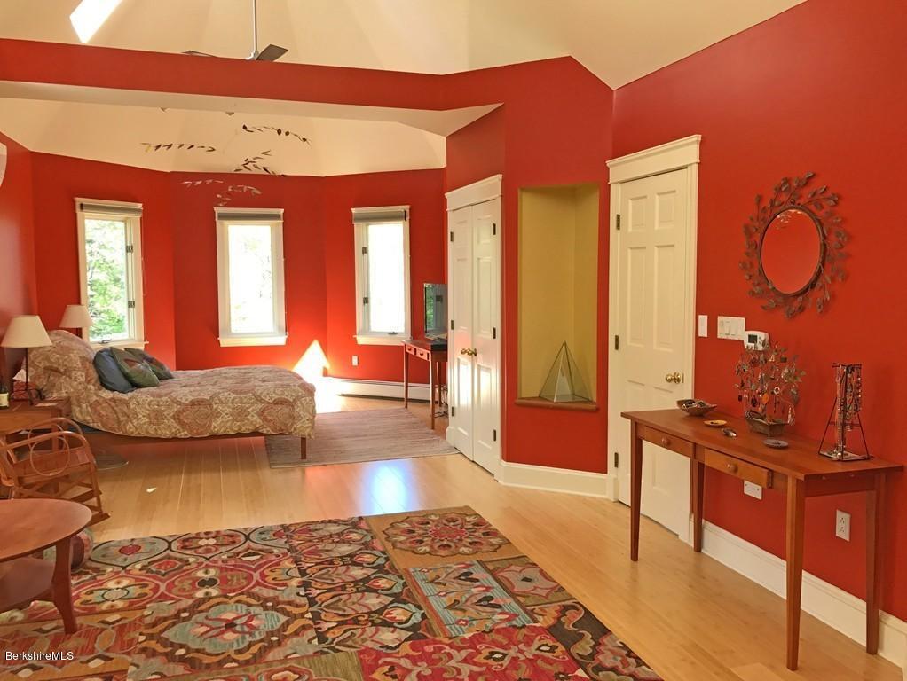 7 Cider Mill Road Williamsburg, MA 01039 - Photo 8 of 30 a living room with furniture a large window and wooden floor