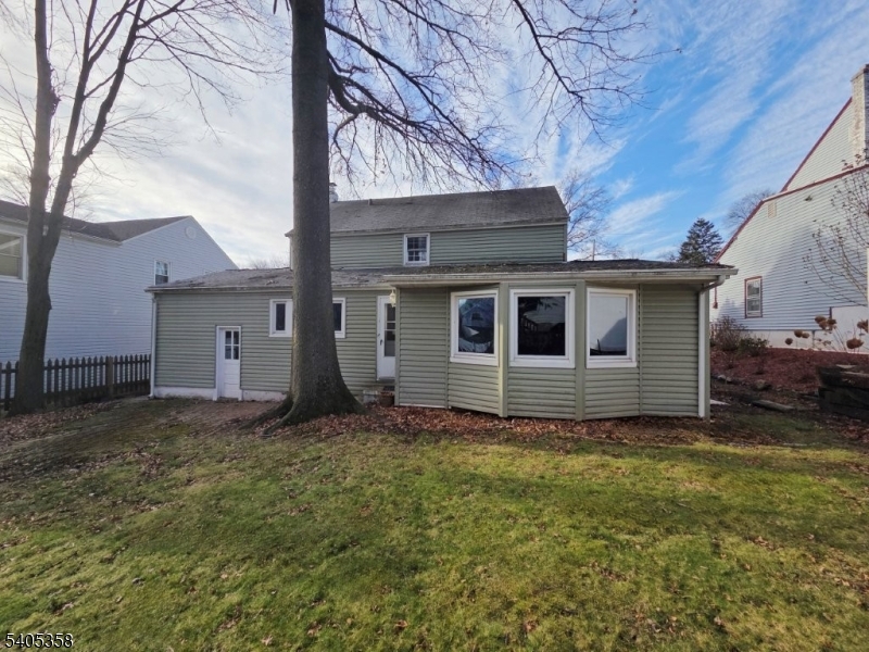 377 Lum Avenue Union, NJ 07083 - Photo 13 of 13 a view of a house with a yard