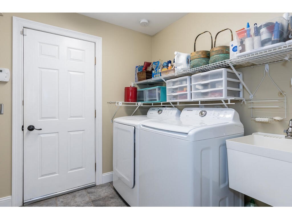 79 Pomeroy Meadow Road Southampton, MA 01073 - Photo 21 of 42 a utility room with dryer and washer
