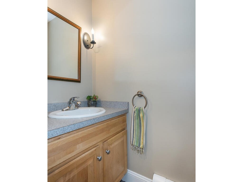 79 Pomeroy Meadow Road Southampton, MA 01073 - Photo 22 of 42 a bathroom with a sink and a mirror
