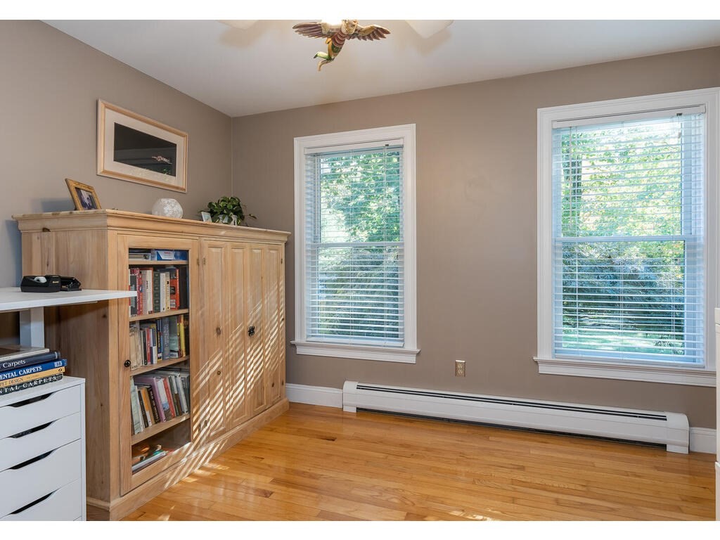 79 Pomeroy Meadow Road Southampton, MA 01073 - Photo 23 of 42 a view of an empty room with workspace and a window