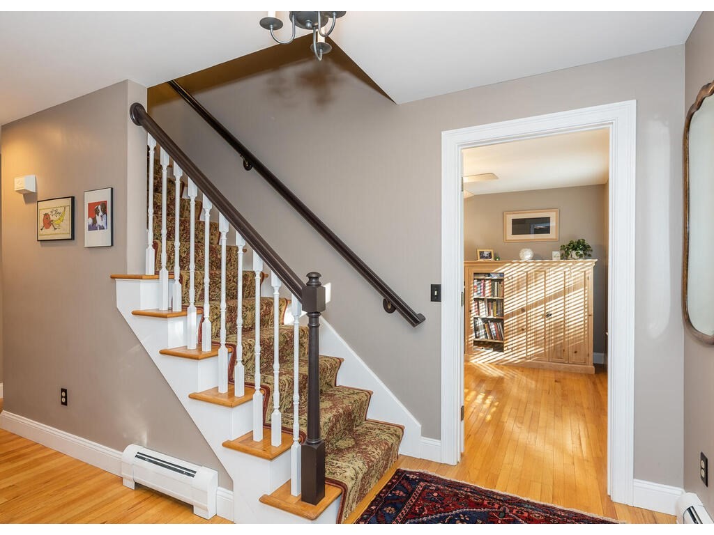 79 Pomeroy Meadow Road Southampton, MA 01073 - Photo 25 of 42 a view of entryway and hall with wooden floor