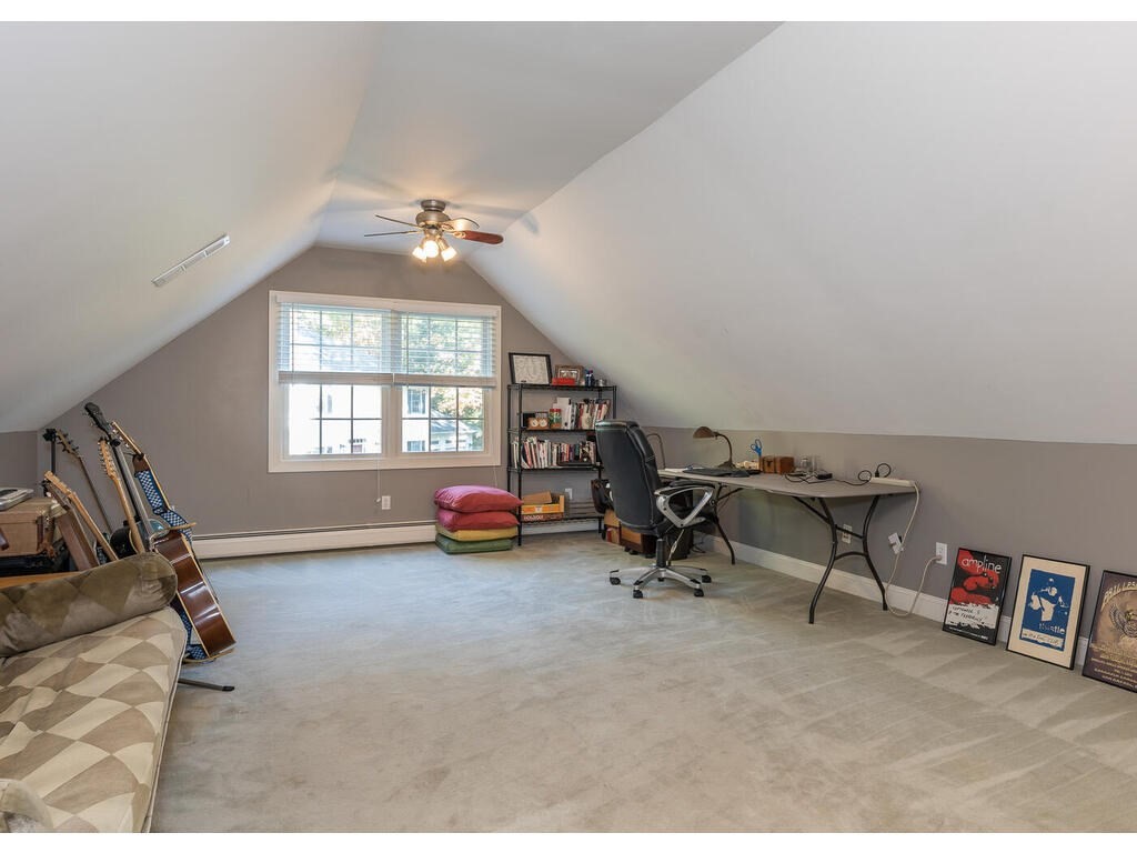 79 Pomeroy Meadow Road Southampton, MA 01073 - Photo 38 of 42 a view of a livingroom with furniture and a ceiling fan