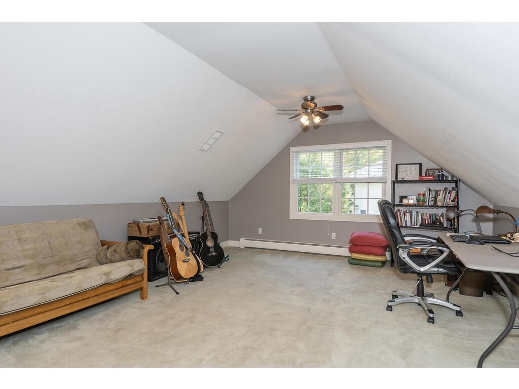 79 Pomeroy Meadow Road Southampton, MA 01073 - Photo 39 of 42 a view of a room with gym equipment and a window