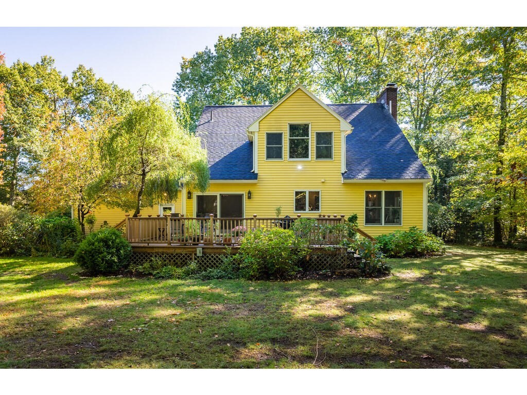 79 Pomeroy Meadow Road Southampton, MA 01073 - Photo 4 of 42 a front view of a house with a yard