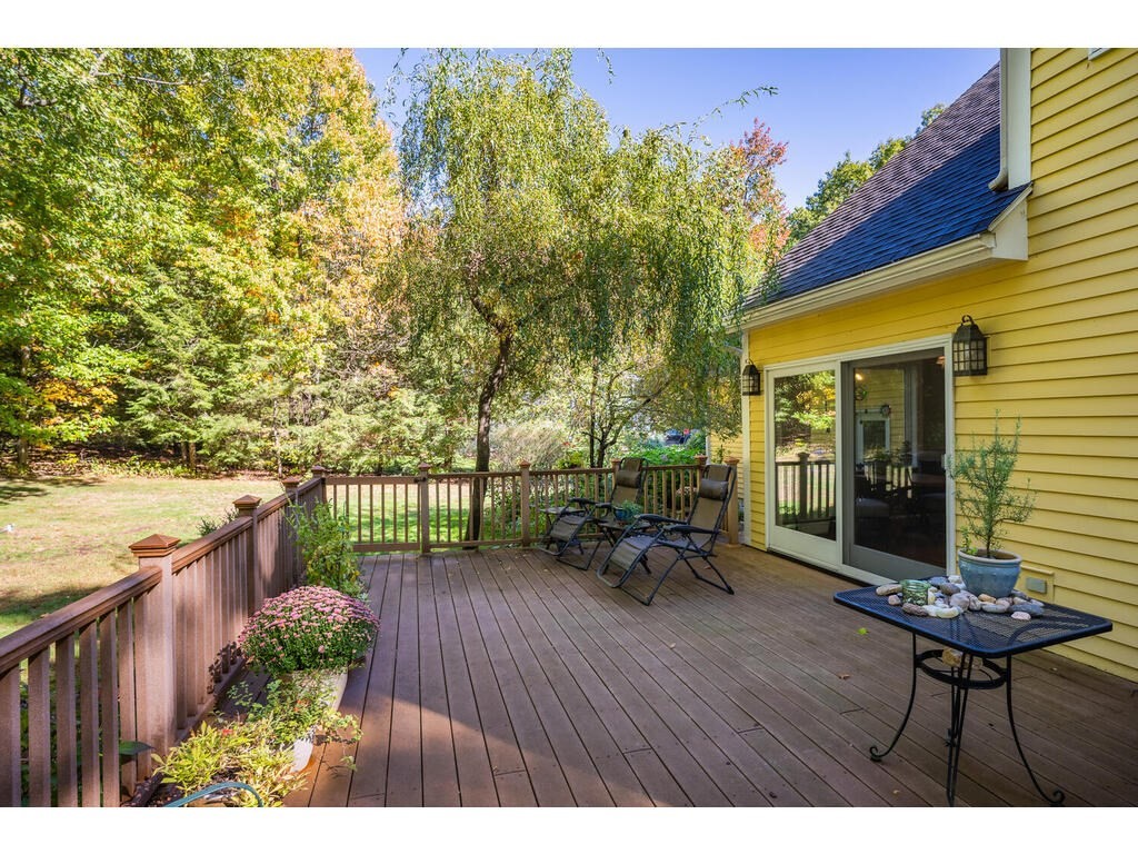79 Pomeroy Meadow Road Southampton, MA 01073 - Photo 5 of 42 a balcony with wooden floor