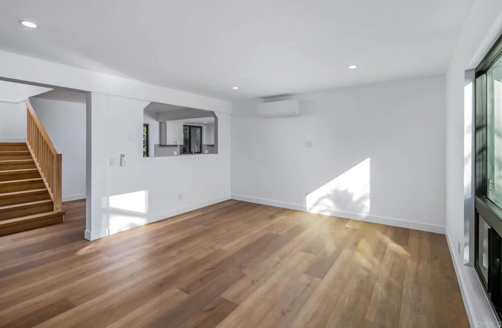250 Hillcrest Drive Encinitas, CA 92024 - Photo 23 of 54 a view of empty room with wooden floor
