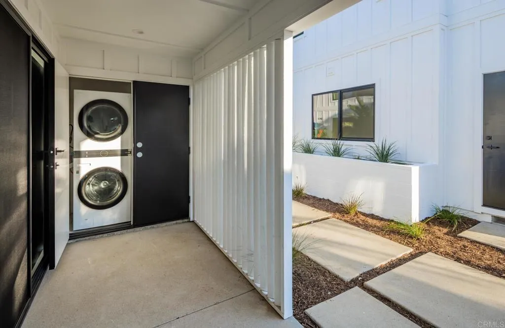 250 Hillcrest Drive Encinitas, CA 92024 - Photo 37 of 54 a view of a storage and utility room with washer and dryer