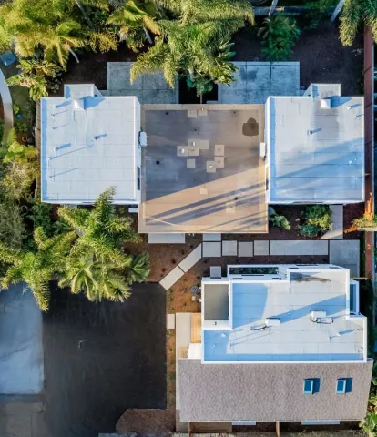 a view of empty room with wooden floor and fireplace