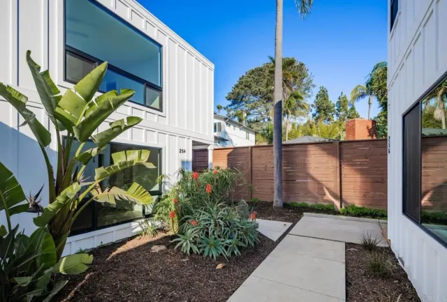 a view of a house with small yard