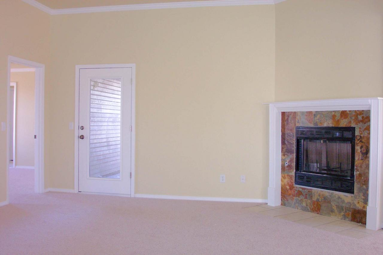 1024 Shasta Drive Amarillo, TX 79110 - Photo 5 of 5 a view of an empty room with a fireplace
