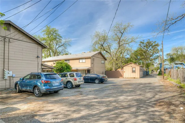 a view of a car parked in front of house