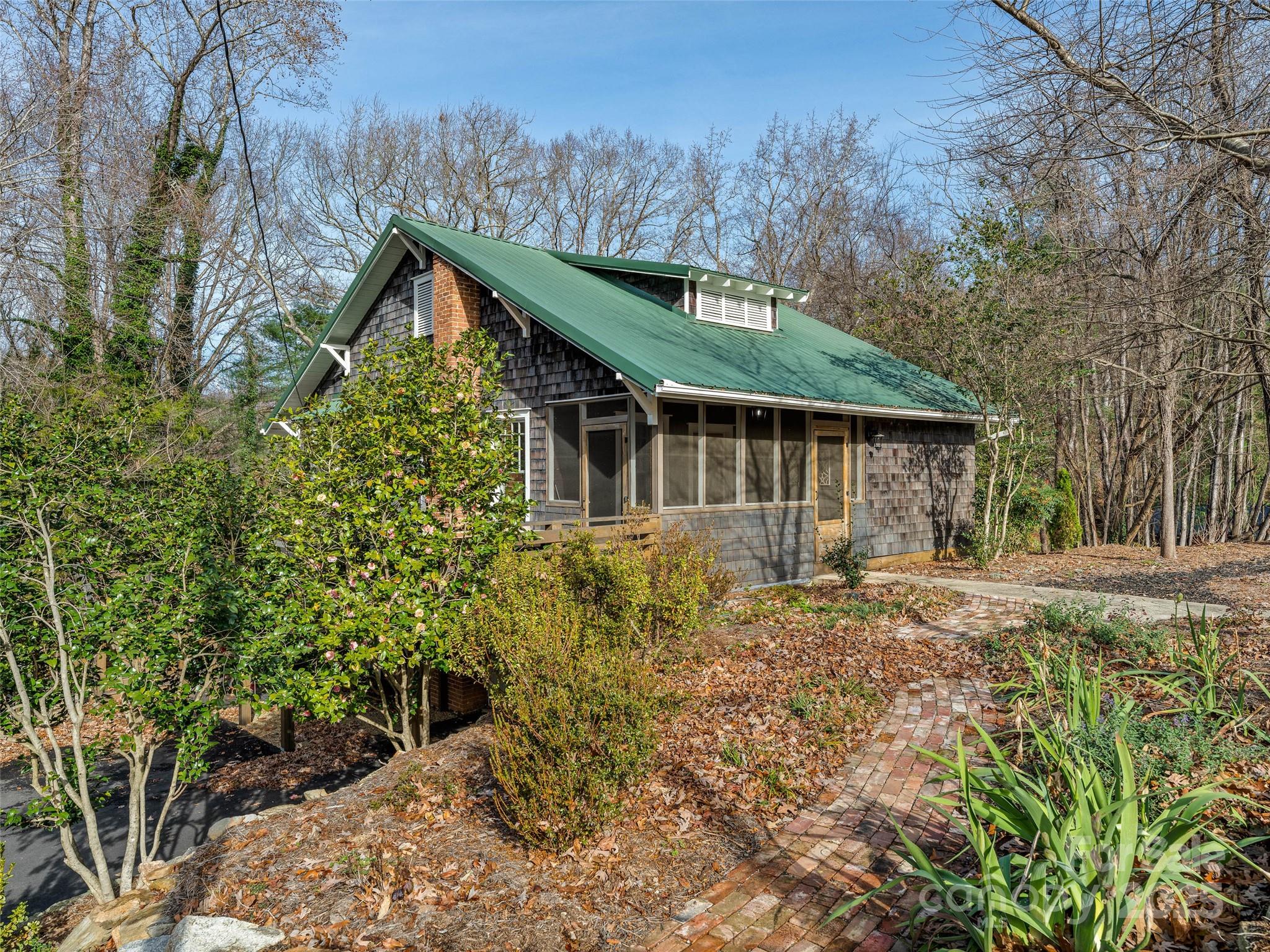 a house with trees in the background