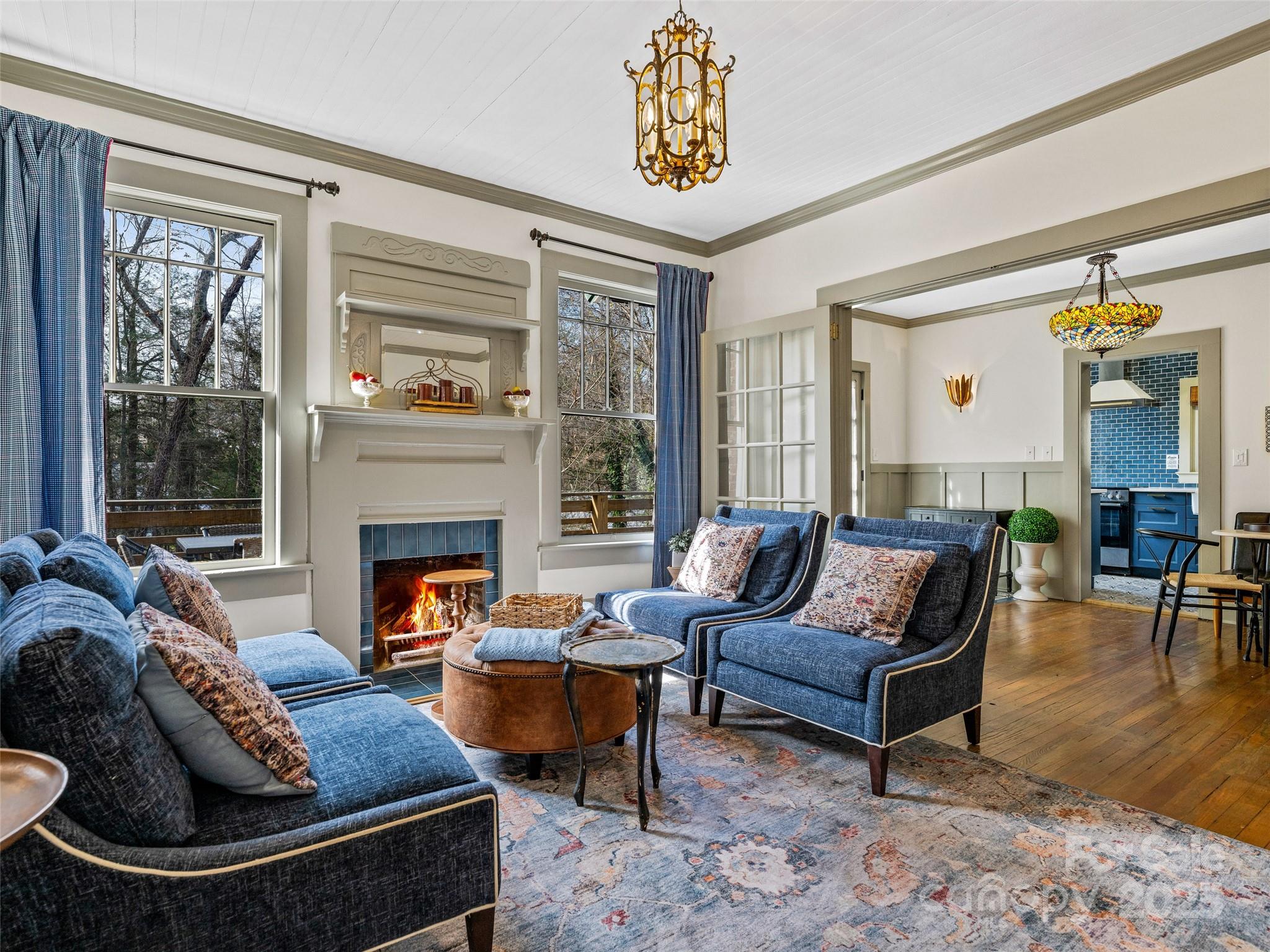 277 Markham Road Tryon, NC 28782 - Photo 15 of 44 a living room with furniture and a fireplace
