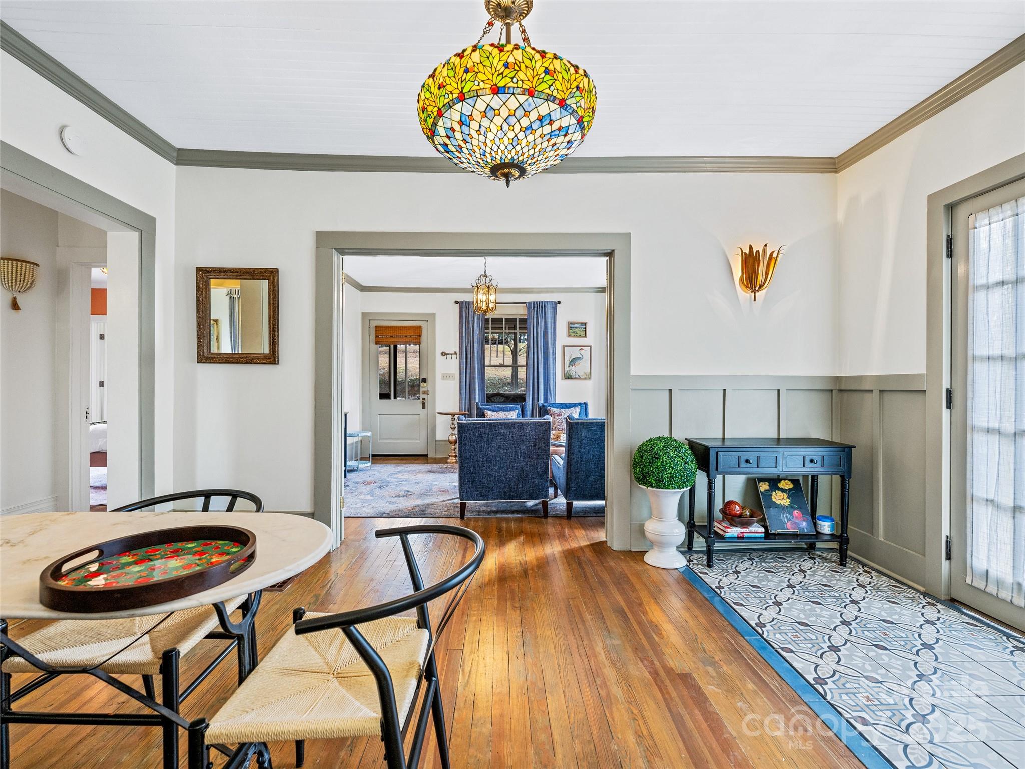 277 Markham Road Tryon, NC 28782 - Photo 20 of 44 a living room with furniture and a table