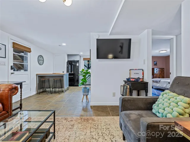 a spacious bathroom with a sink a mirror and a bathtub