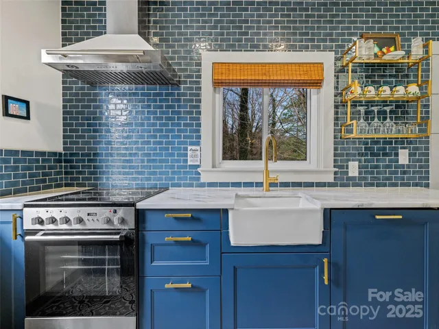 a kitchen with a stove and cabinets