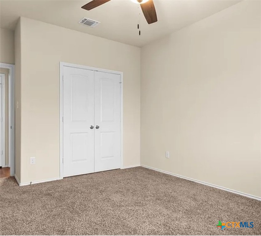 5561 Perdita Drive Belton, TX 76513 - Photo 14 of 24 an empty room with closet and windows