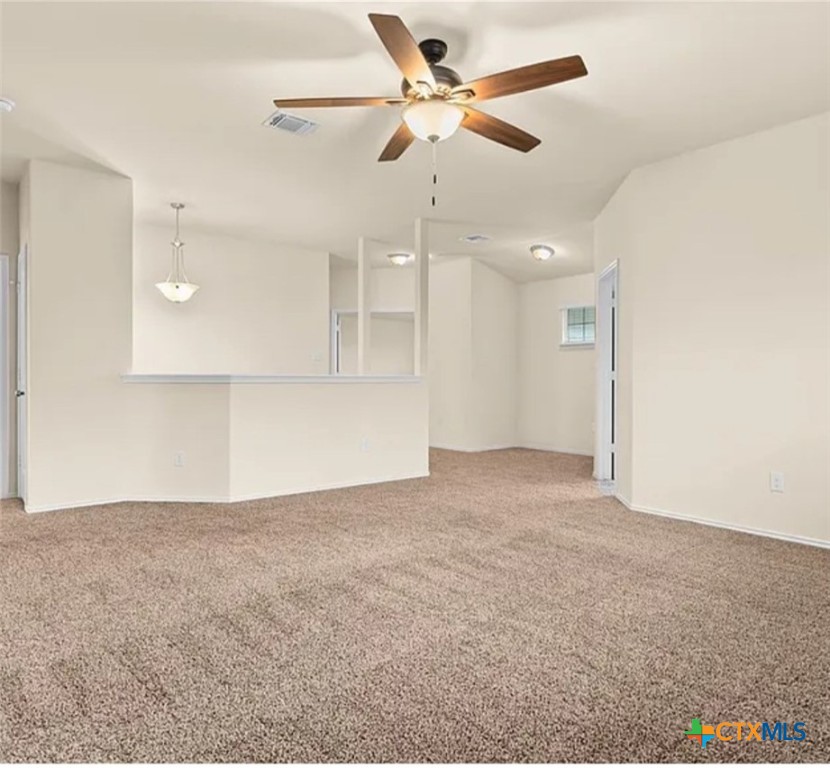 5561 Perdita Drive Belton, TX 76513 - Photo 16 of 24 a view of an empty room with a ceiling fan