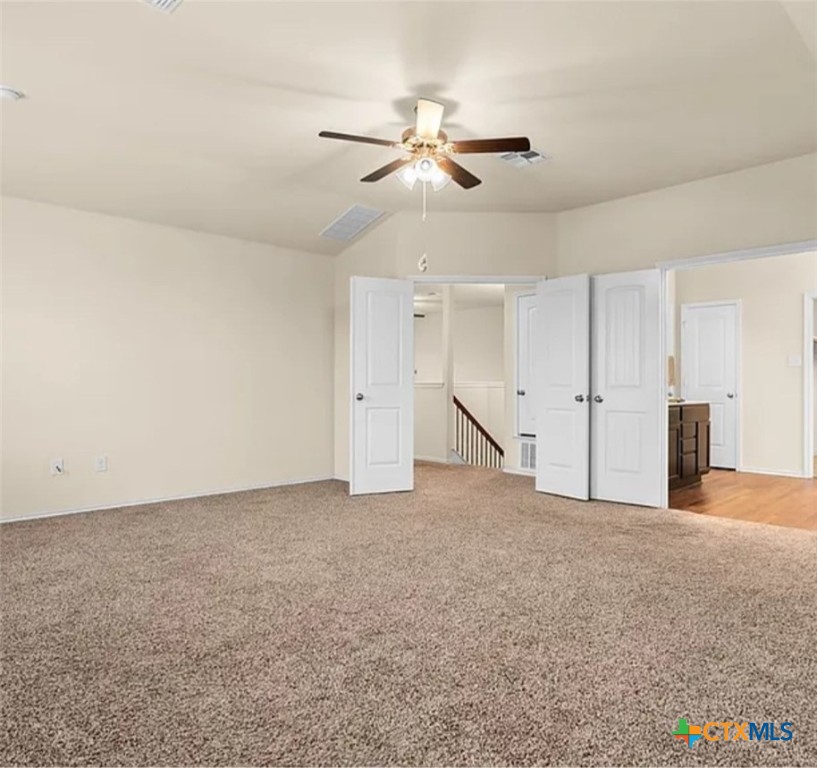 5561 Perdita Drive Belton, TX 76513 - Photo 18 of 24 a view of an empty room with a ceiling fan