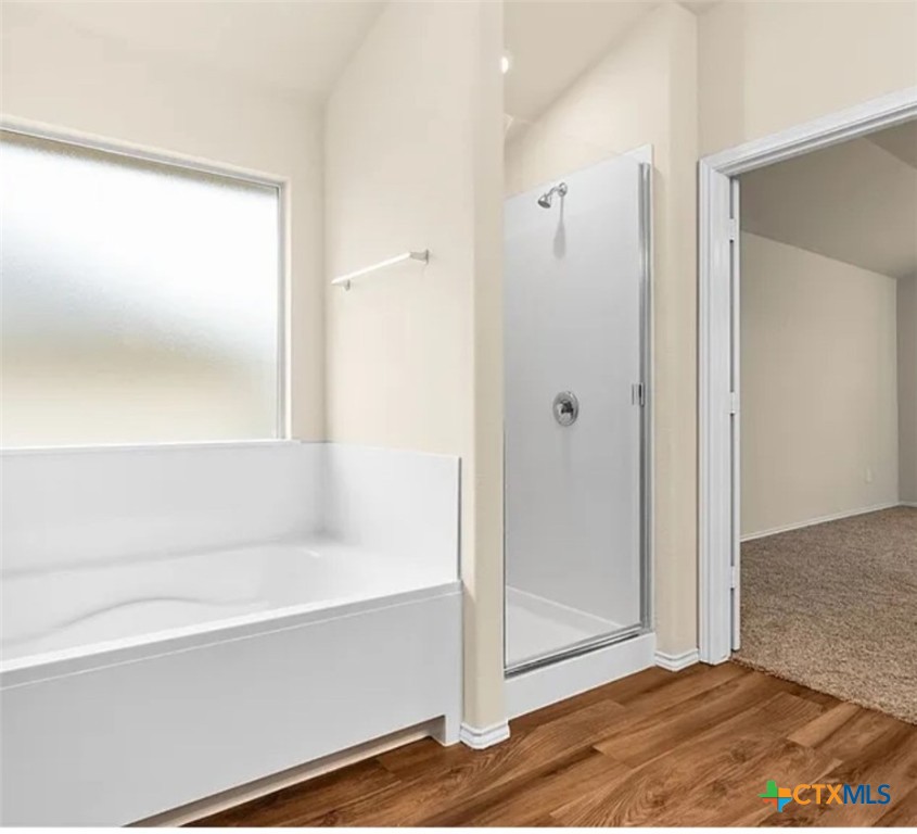 5561 Perdita Drive Belton, TX 76513 - Photo 20 of 24 a bathroom with a bathtub and a shower