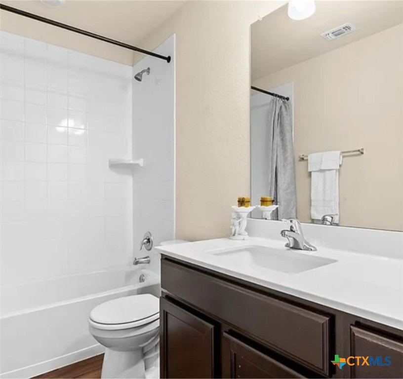 5561 Perdita Drive Belton, TX 76513 - Photo 22 of 24 a bathroom with a sink and a mirror