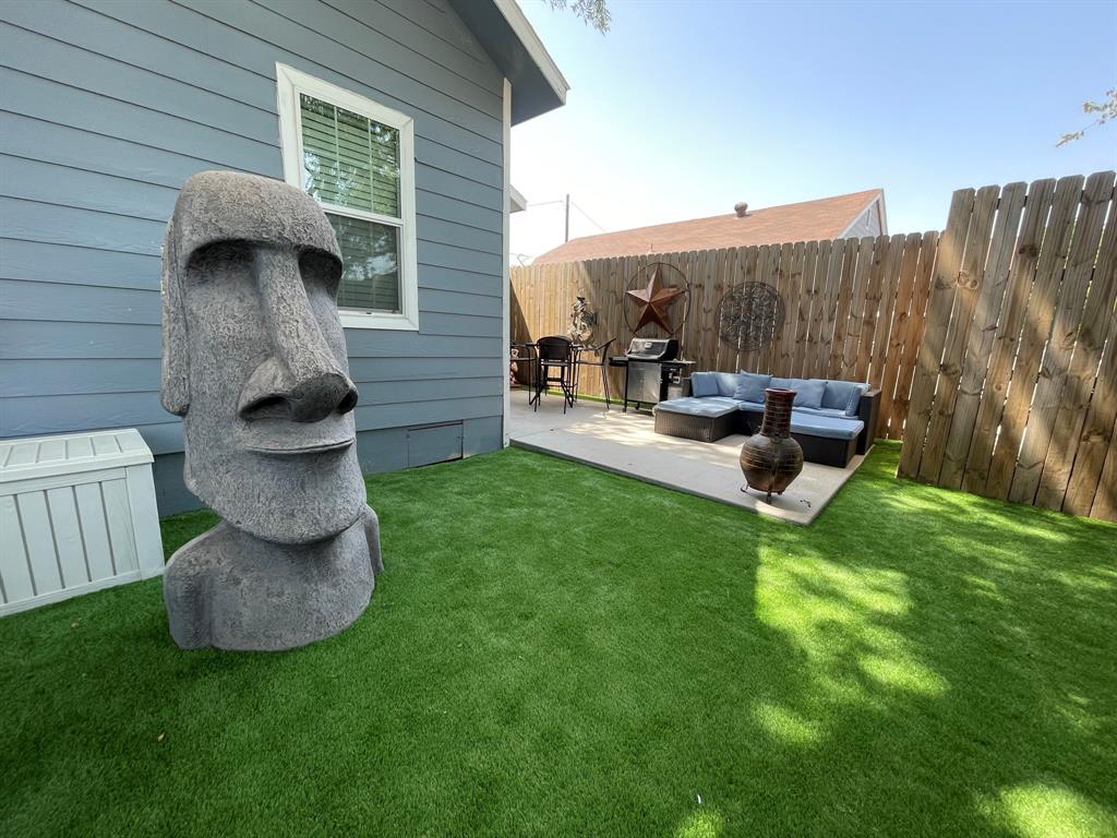 702 North Tennessee Street McKinney, TX 75069 - Photo 2 of 10 a view of garden with patio