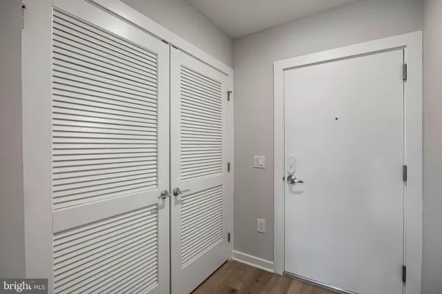 a view of a room with a door